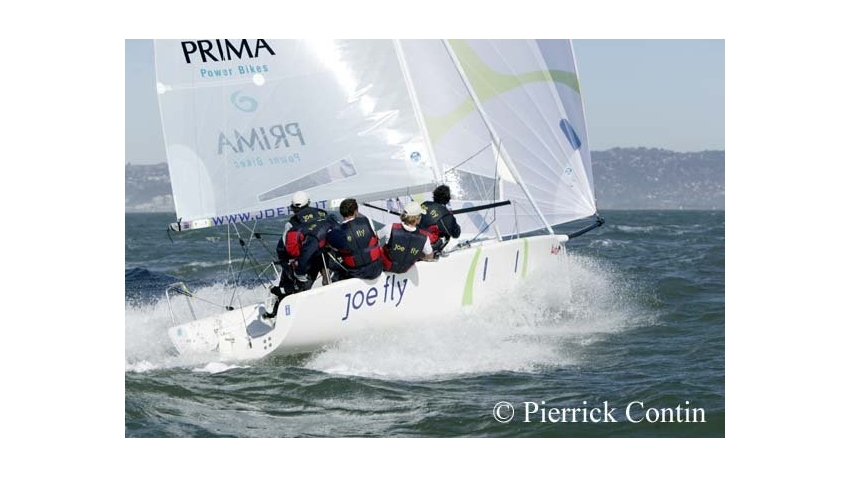 Luca Santella flies downwind on day 4 of the Melges 24 Worlds 2003