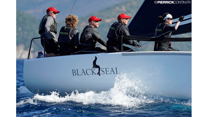 Richard Thompson and his Black Seal with Nigel Young, Stefano Cherin, Michael Claxton and Catherine Alton  - 2019 Melges 24 World Championship - Villasimius, Sardinia, Italy