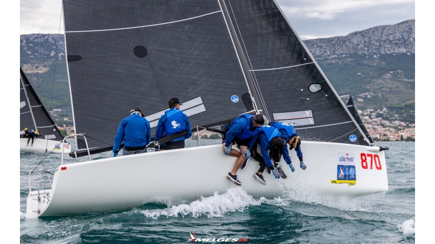 Cuyler Morris and Manu Weiler sitting in the cockpit racing Dark Horse USA870 at the Melges 24 European Championship 2024 in Split, Croatia