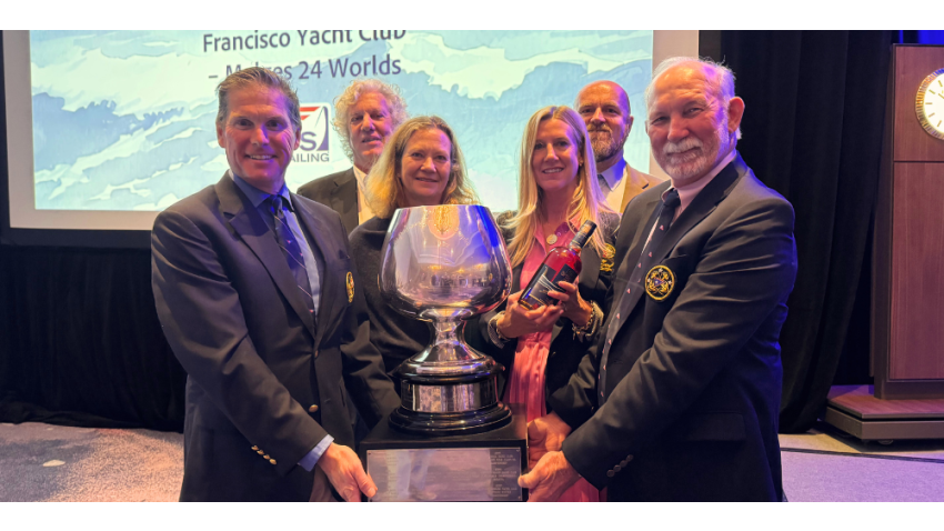 Pictured with the trophy: Matthew Sessions, John Reichel, Laura Grondin, S/C Jenni Dailey, Forrest Gay and Mark Foster.